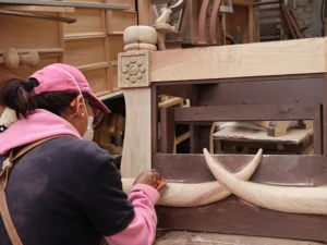 Reata Ranch Interiors 13 Adding final touches to wood carving