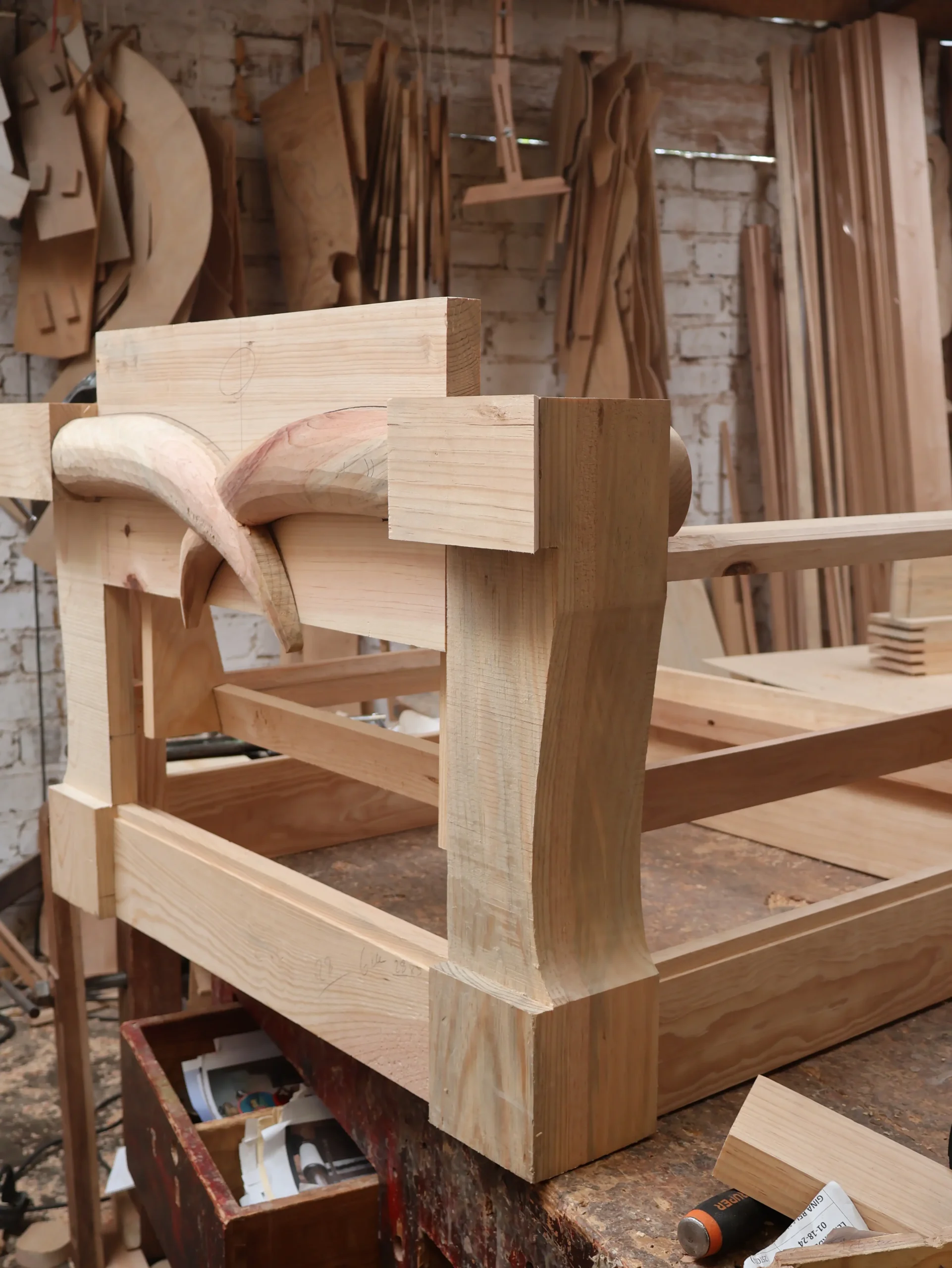 Sanding hand-carved furniture surfaces